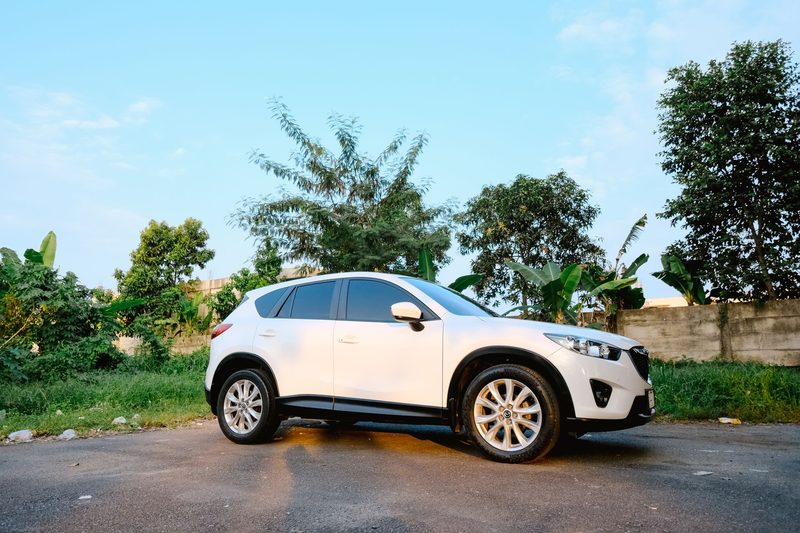 A white SUV, like a typical rental car