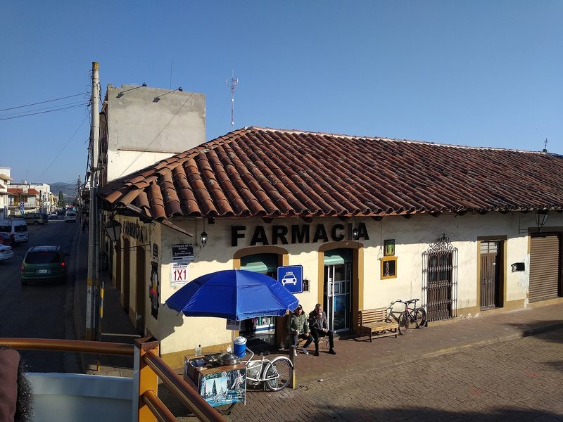 A neighborhood pharmacy storefront in Mexico
