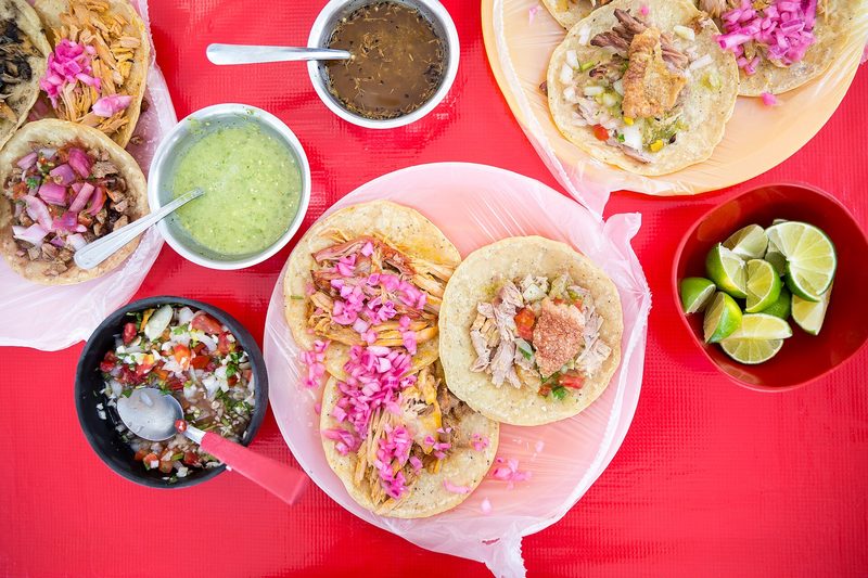 Tacos on a taqueria table (illustrative photo)