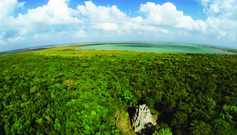 Aerial view of the Muyil archaeological zone and Chunyaxche Lagoon in the Sian Ka'an Biosphere Reserve